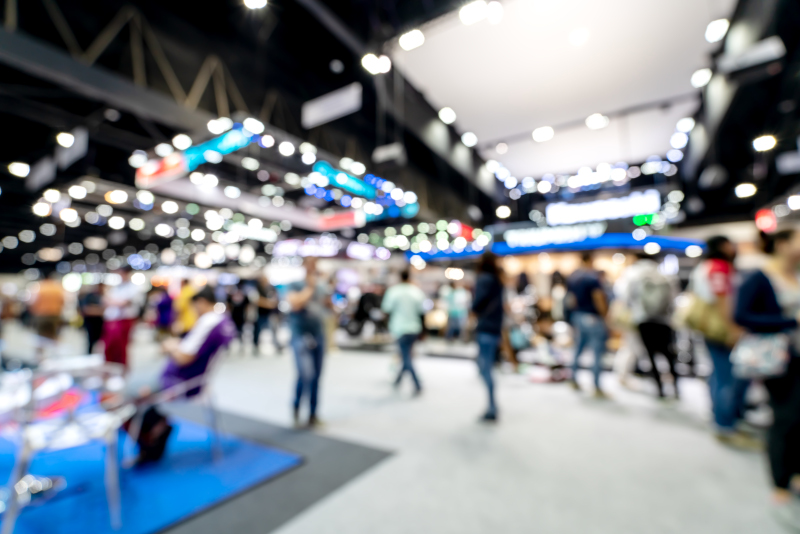 Abstract blurred defocused tradeshow event exhibition, business convention show, job fair, technology expo. Organization company trade fair event. Marketing advertisement concept.
